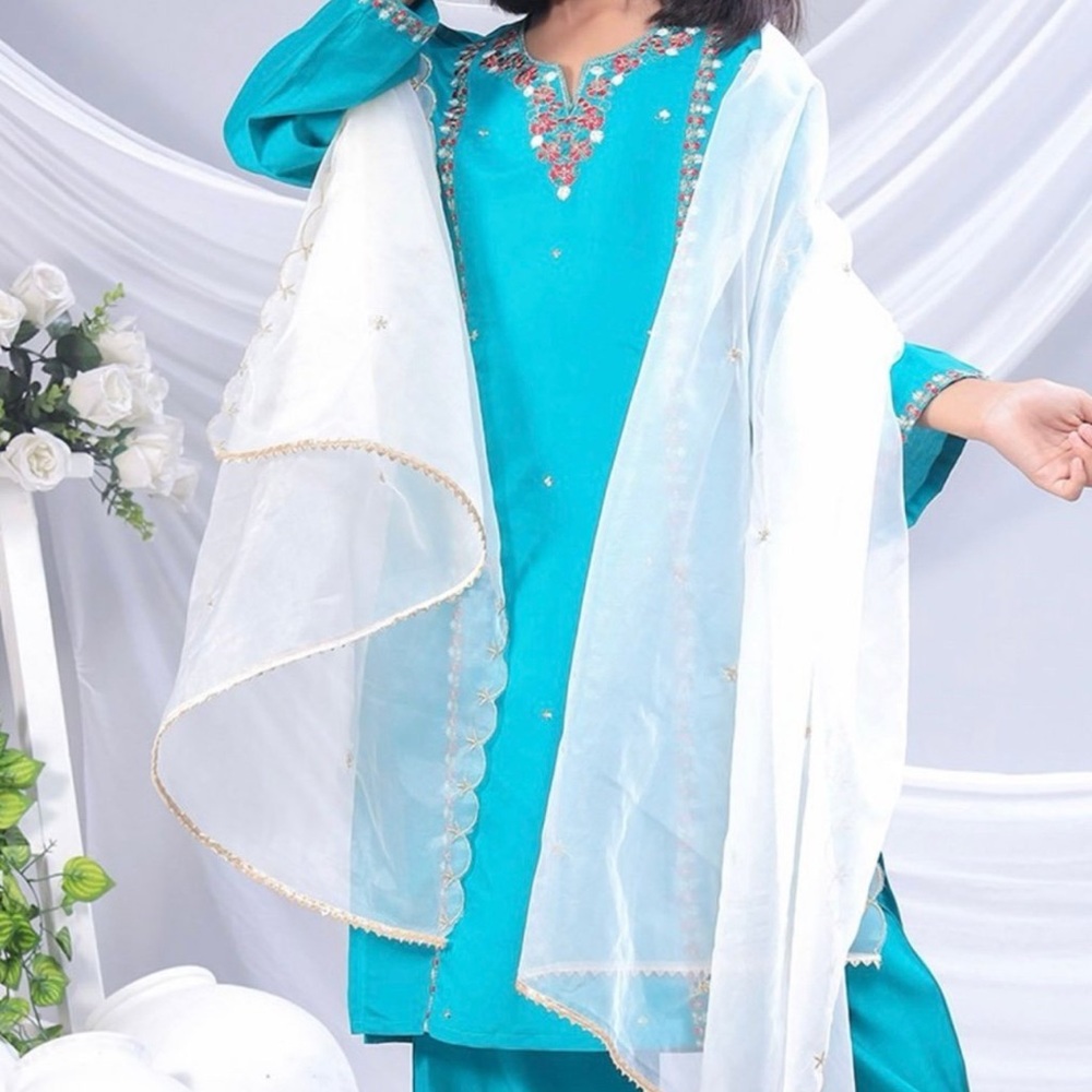 Pakistani suit for girls. 
Teal Embroidered Kurta with White Dupatta